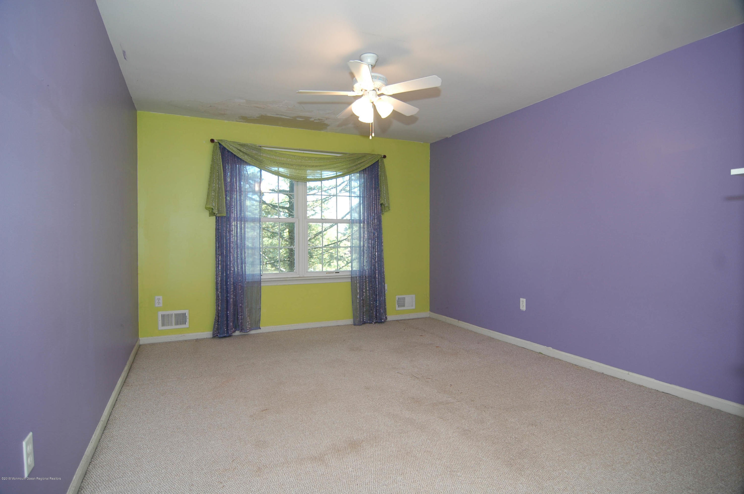 76 Mill Pond Road Jackson, NJ 08527 - Photo 15 of 23 a view of an empty room with a window