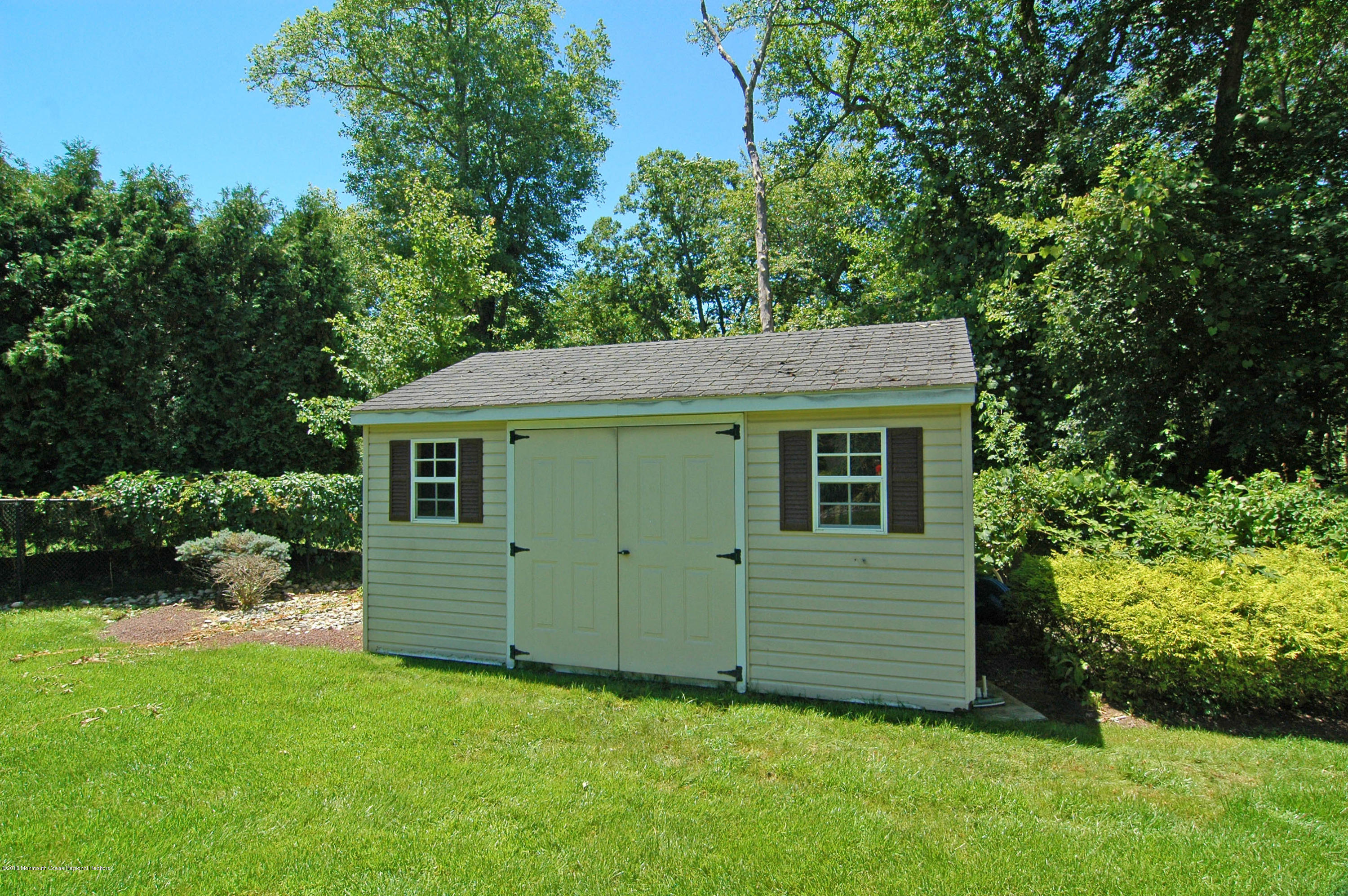 76 Mill Pond Road Jackson, NJ 08527 - Photo 19 of 23 a view of a house with a yard