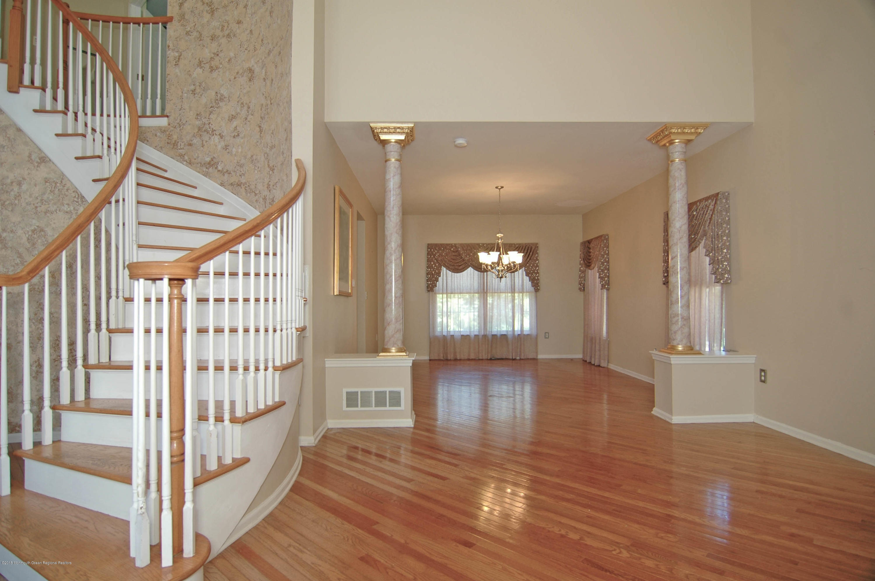76 Mill Pond Road Jackson, NJ 08527 - Photo 7 of 23 a view of entryway with wooden floor