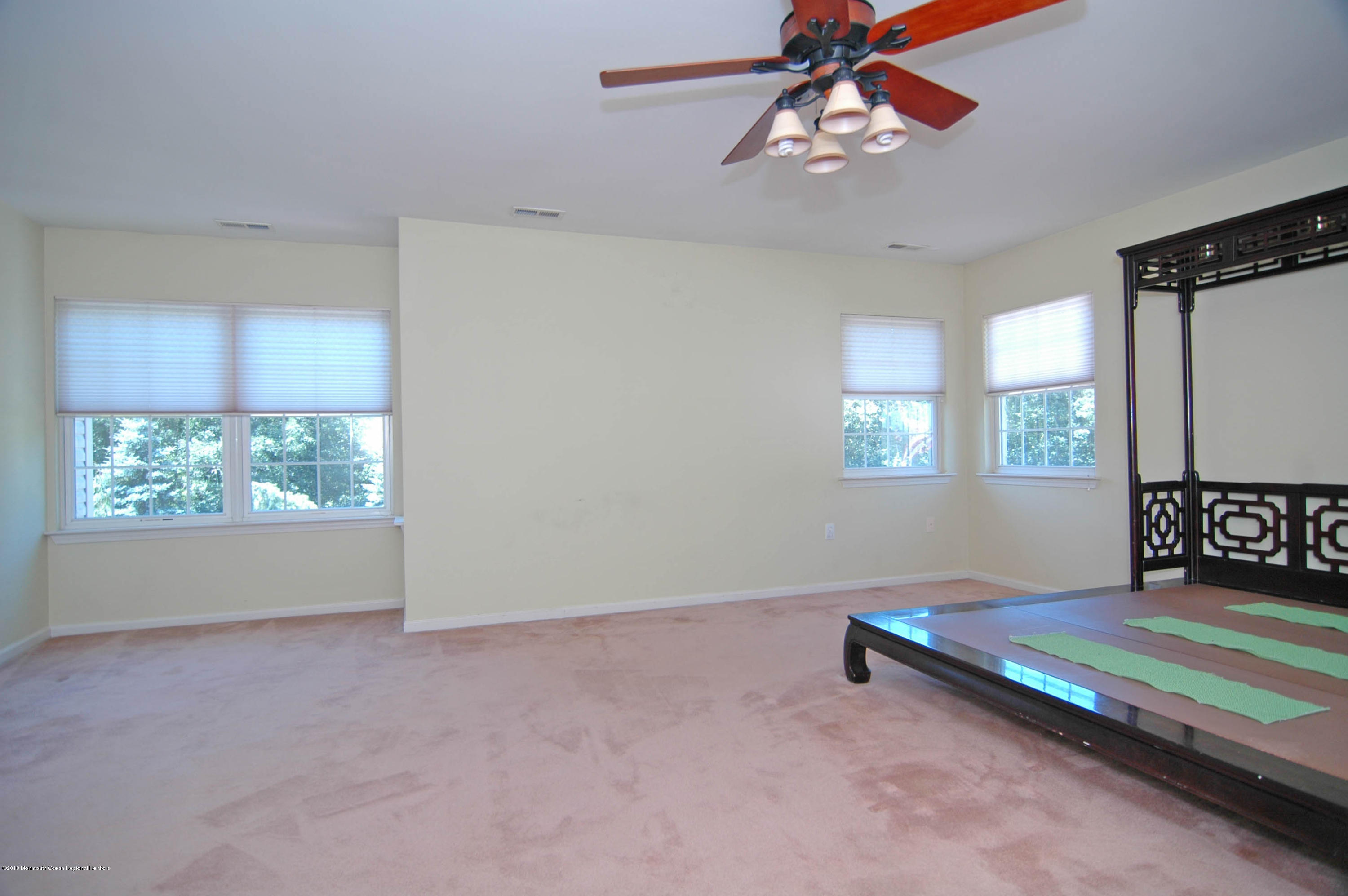 76 Mill Pond Road Jackson, NJ 08527 - Photo 10 of 23 a view of an empty room with a window