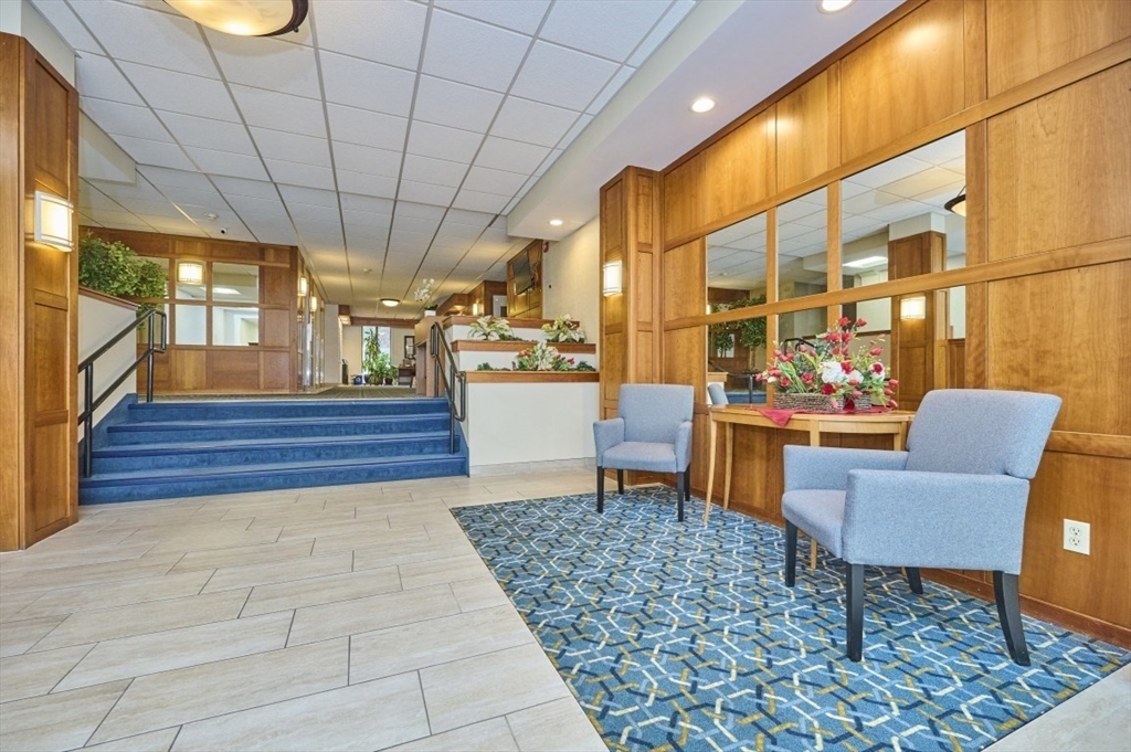 1500 Worcester Road, Unit 612 Framingham, MA 01702 - Photo 2 of 17 a outdoor space with chairs