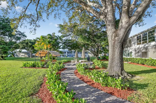 an aerial view of a house with a swimming pool