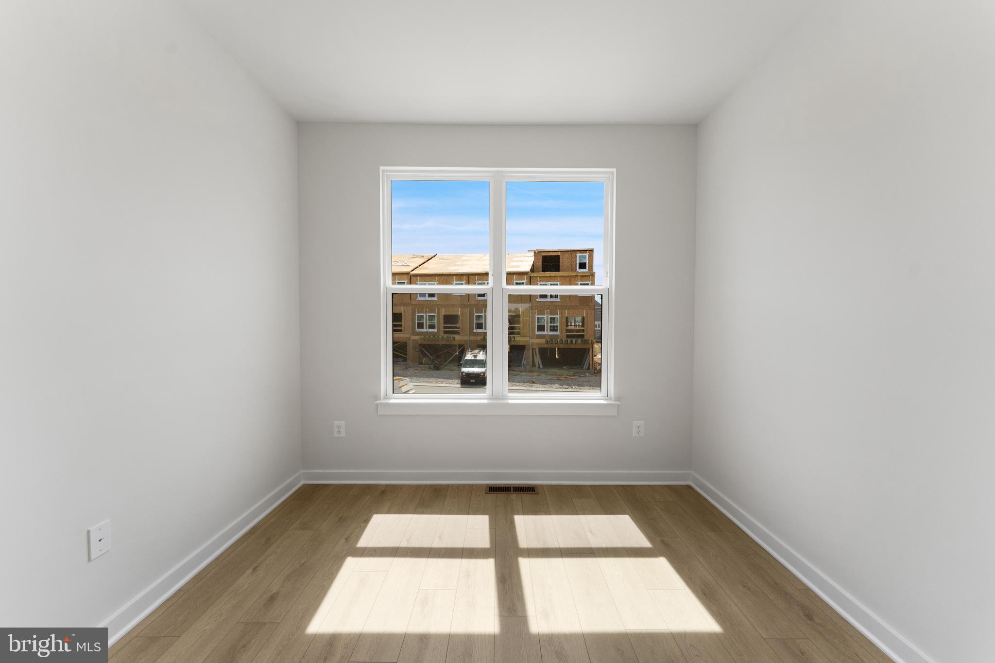 113 Summit Point Boulevard, Unit 19J Bowie, MD 20716 - Photo 12 of 38 a view of a room that has a window in it