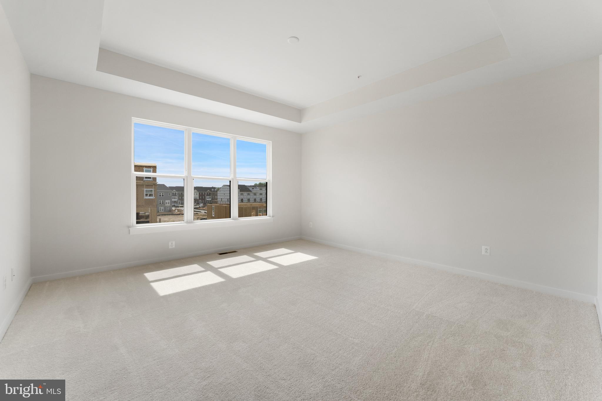113 Summit Point Boulevard, Unit 19J Bowie, MD 20716 - Photo 13 of 38 a view of an empty room with a window
