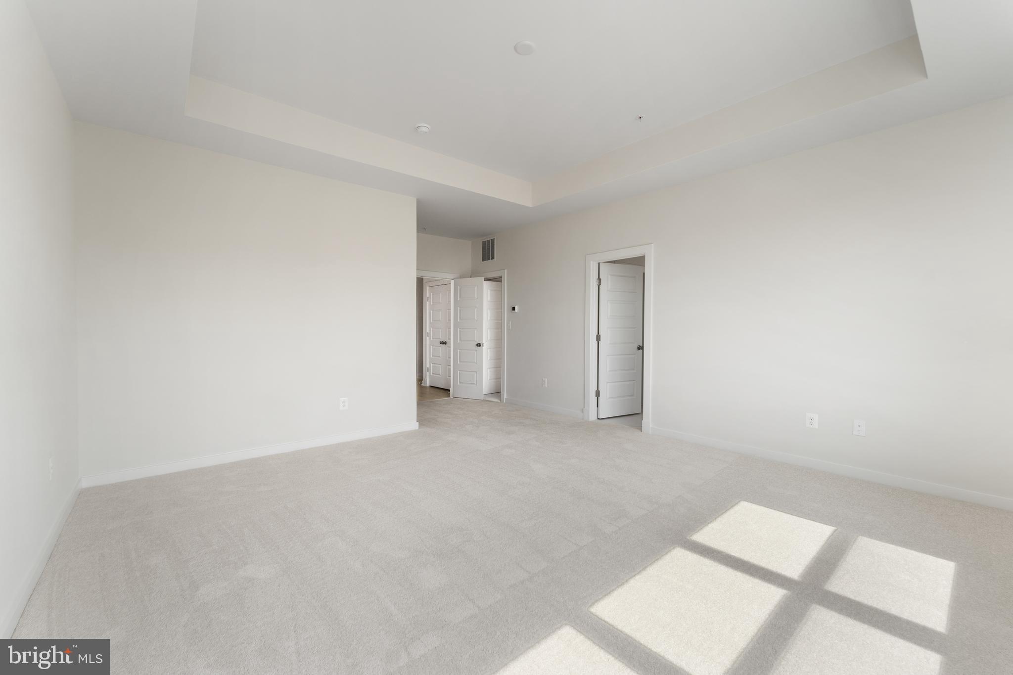 113 Summit Point Boulevard, Unit 19J Bowie, MD 20716 - Photo 14 of 38 a view of an empty room