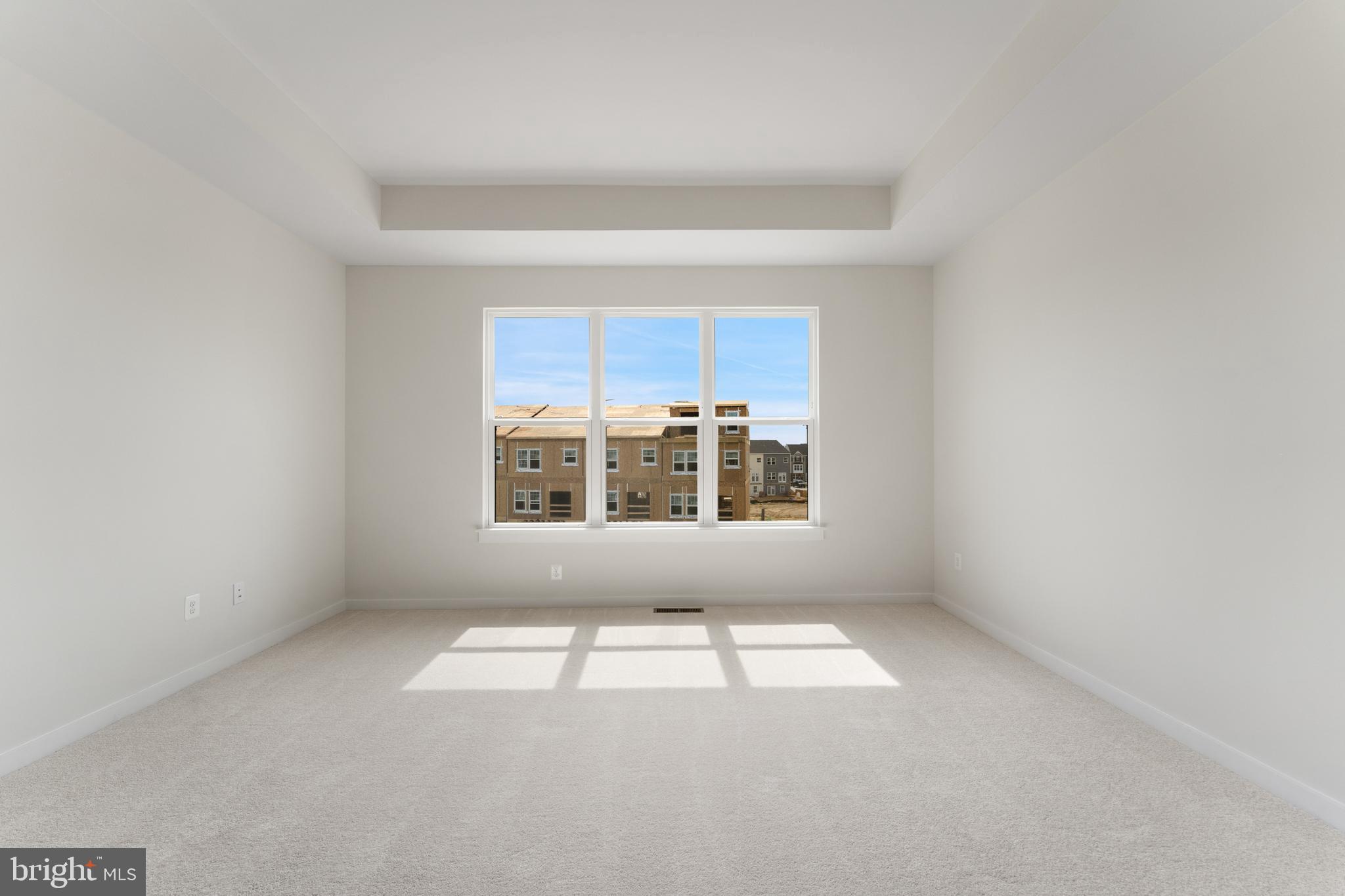 113 Summit Point Boulevard, Unit 19J Bowie, MD 20716 - Photo 15 of 38 an empty room with windows