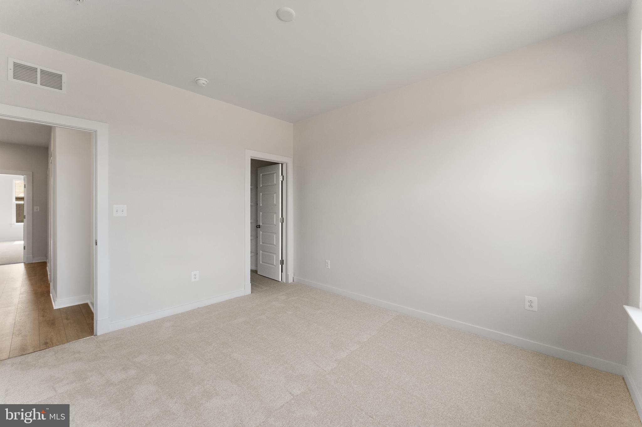 113 Summit Point Boulevard, Unit 19J Bowie, MD 20716 - Photo 32 of 38 a view of an empty room