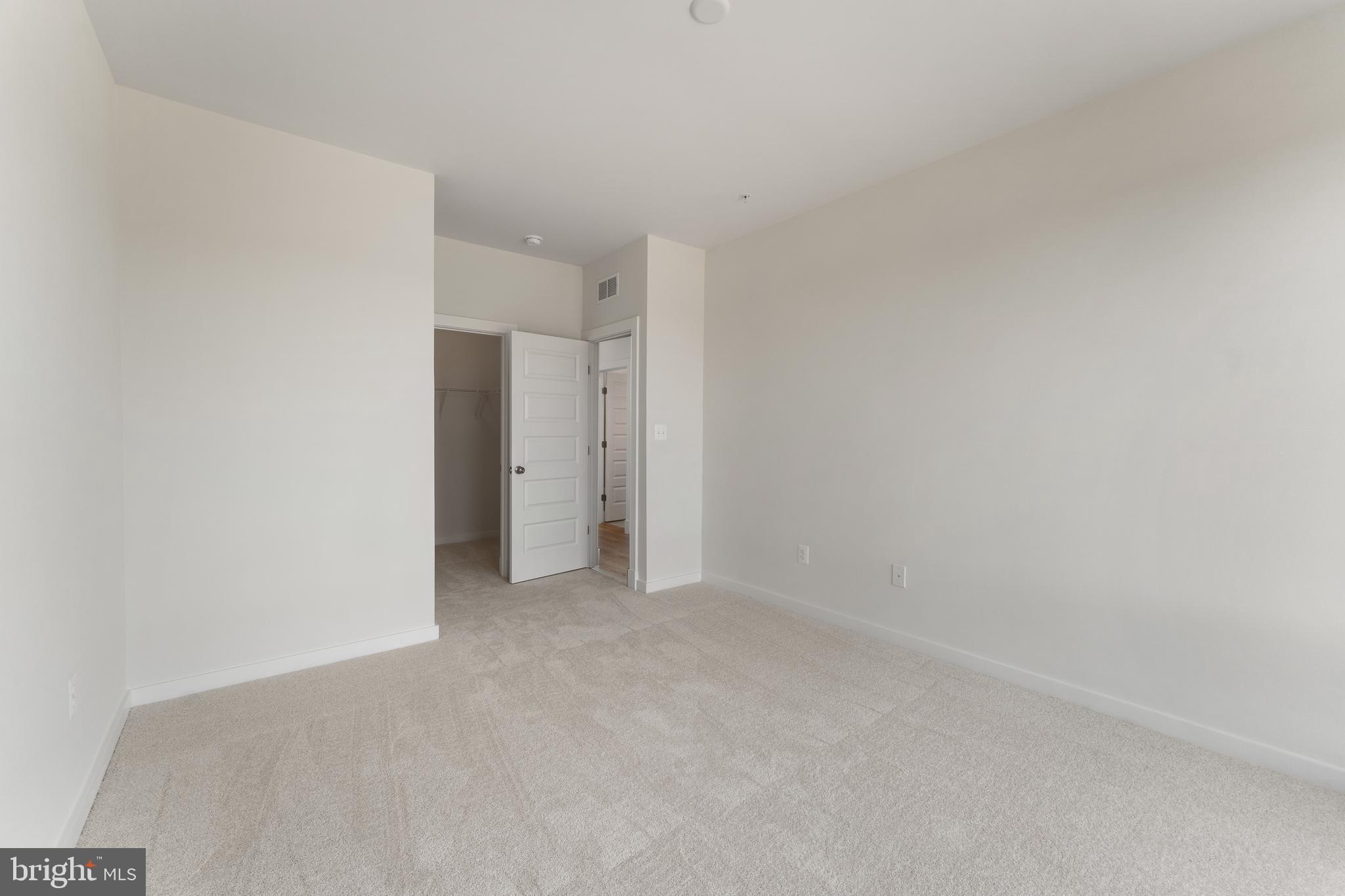 113 Summit Point Boulevard, Unit 19J Bowie, MD 20716 - Photo 34 of 38 a view of an empty room