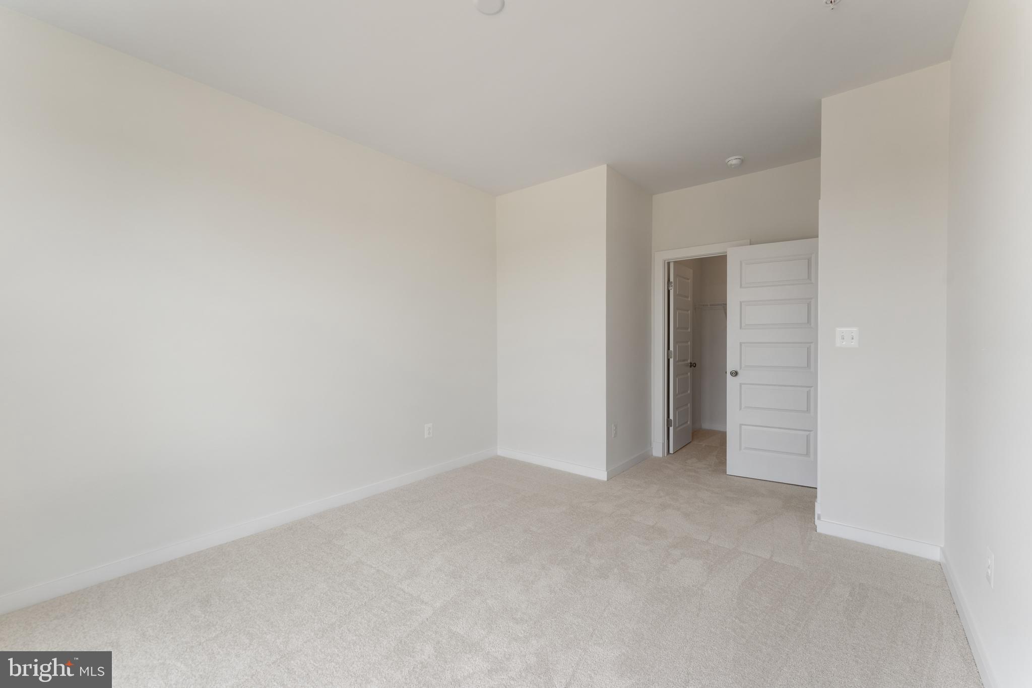 113 Summit Point Boulevard, Unit 19J Bowie, MD 20716 - Photo 35 of 38 a view of empty room