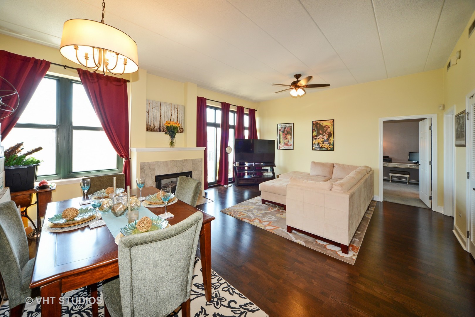 1301 West Washington Boulevard, Unit 404D Chicago, IL 60607 - Photo 3 of 11 a living room with fireplace furniture and a chandelier