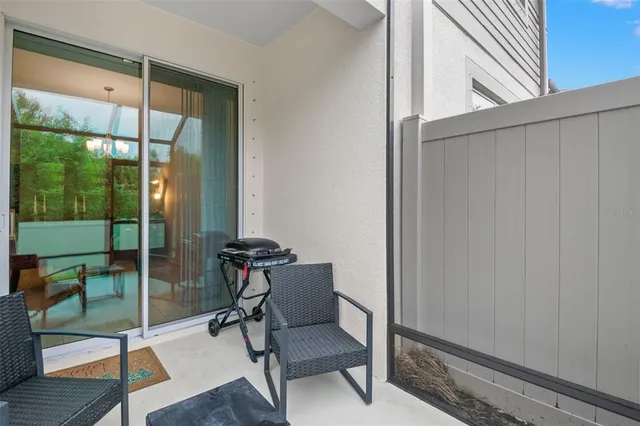a aerial view of a house with a yard