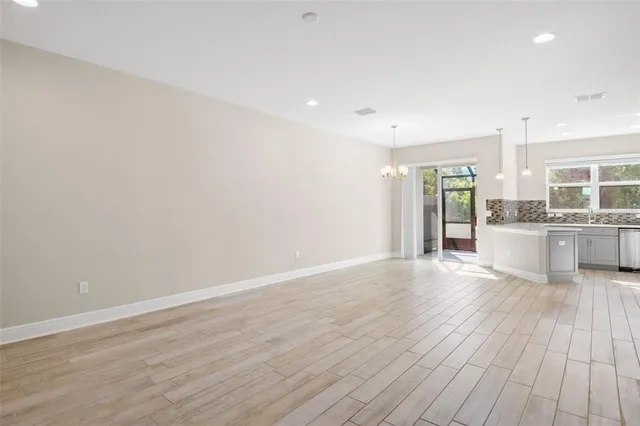 a view of kitchen with wooden floor