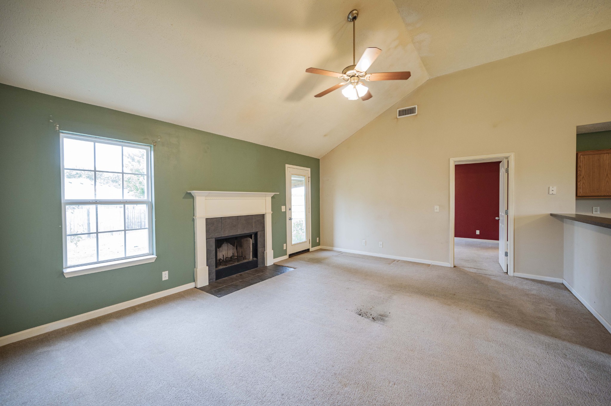 1324 Macduff Drive Murfreesboro, TN 37128 - Photo 13 of 35 an empty room with windows and fireplace