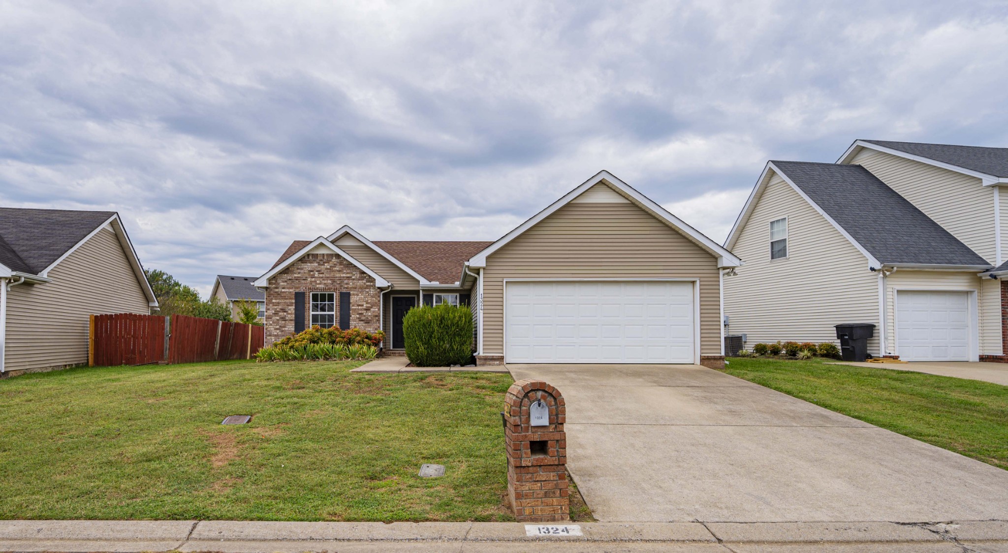1324 Macduff Drive Murfreesboro, TN 37128 - Photo 2 of 35 a view of a house with a yard
