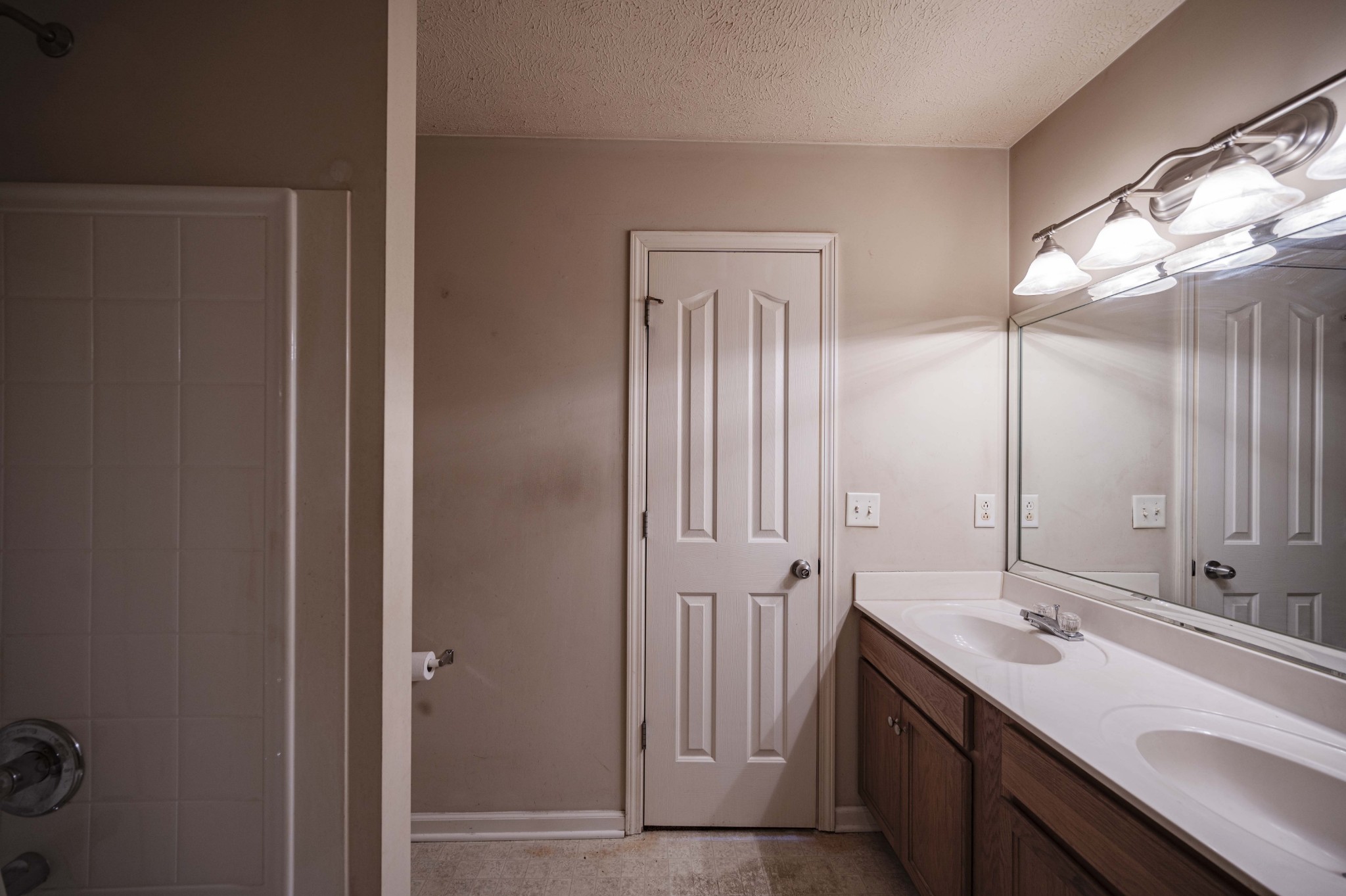 1324 Macduff Drive Murfreesboro, TN 37128 - Photo 25 of 35 a bathroom with a double vanity sink and a mirror
