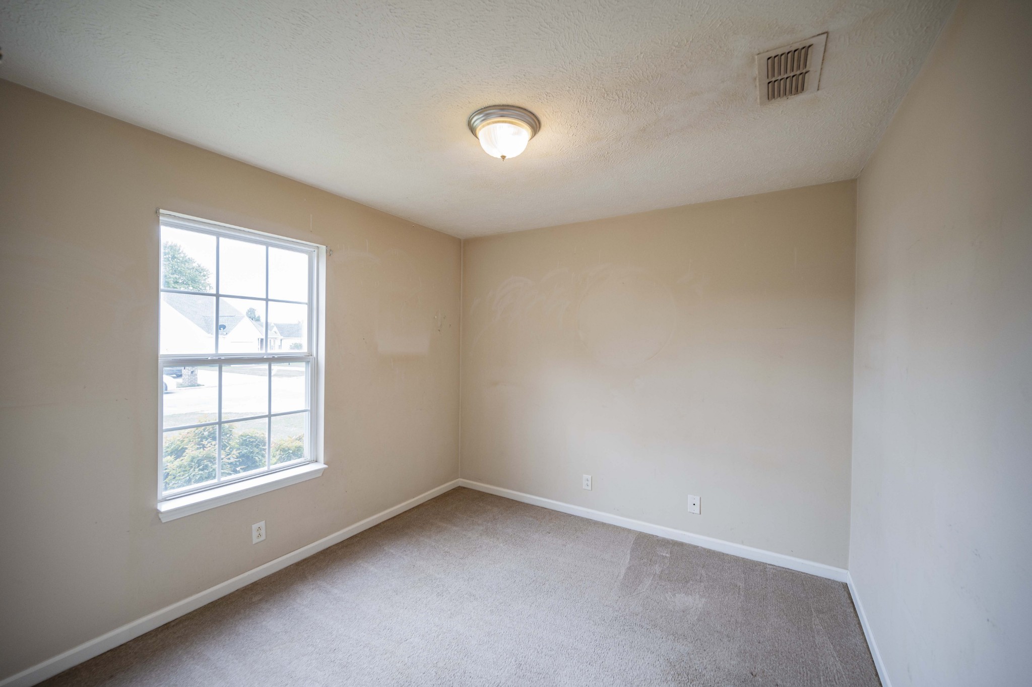 1324 Macduff Drive Murfreesboro, TN 37128 - Photo 31 of 35 an empty room with a window