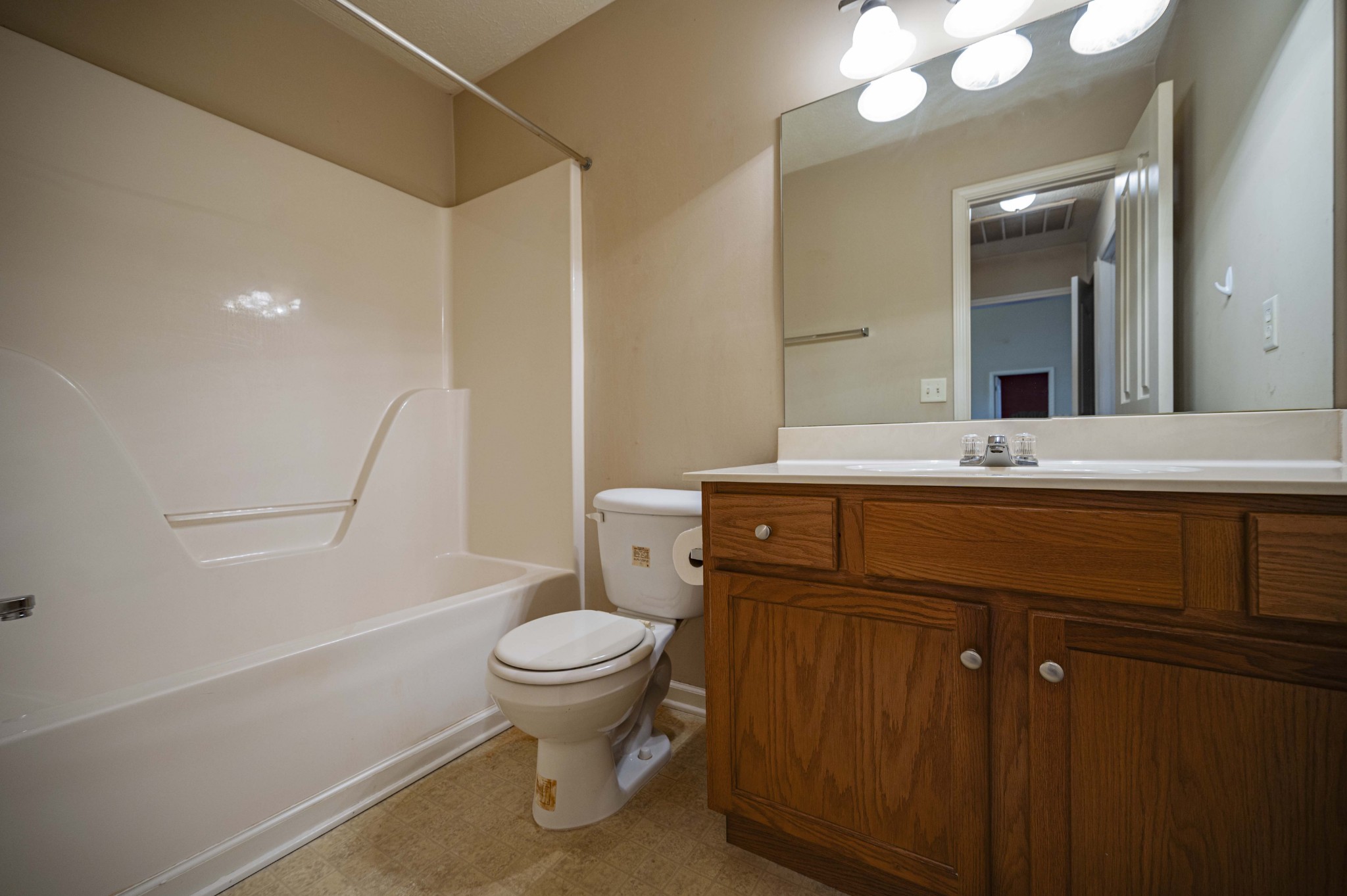 1324 Macduff Drive Murfreesboro, TN 37128 - Photo 32 of 35 a bathroom with a sink toilet and mirror