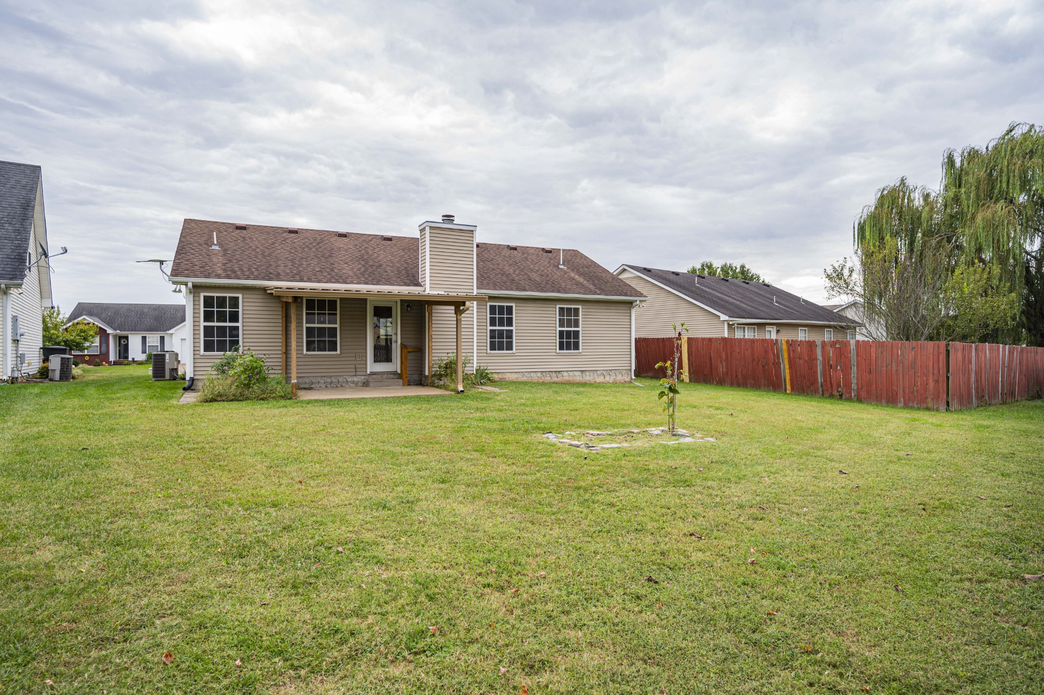 1324 Macduff Drive Murfreesboro, TN 37128 - Photo 8 of 35 a front view of a house with garden