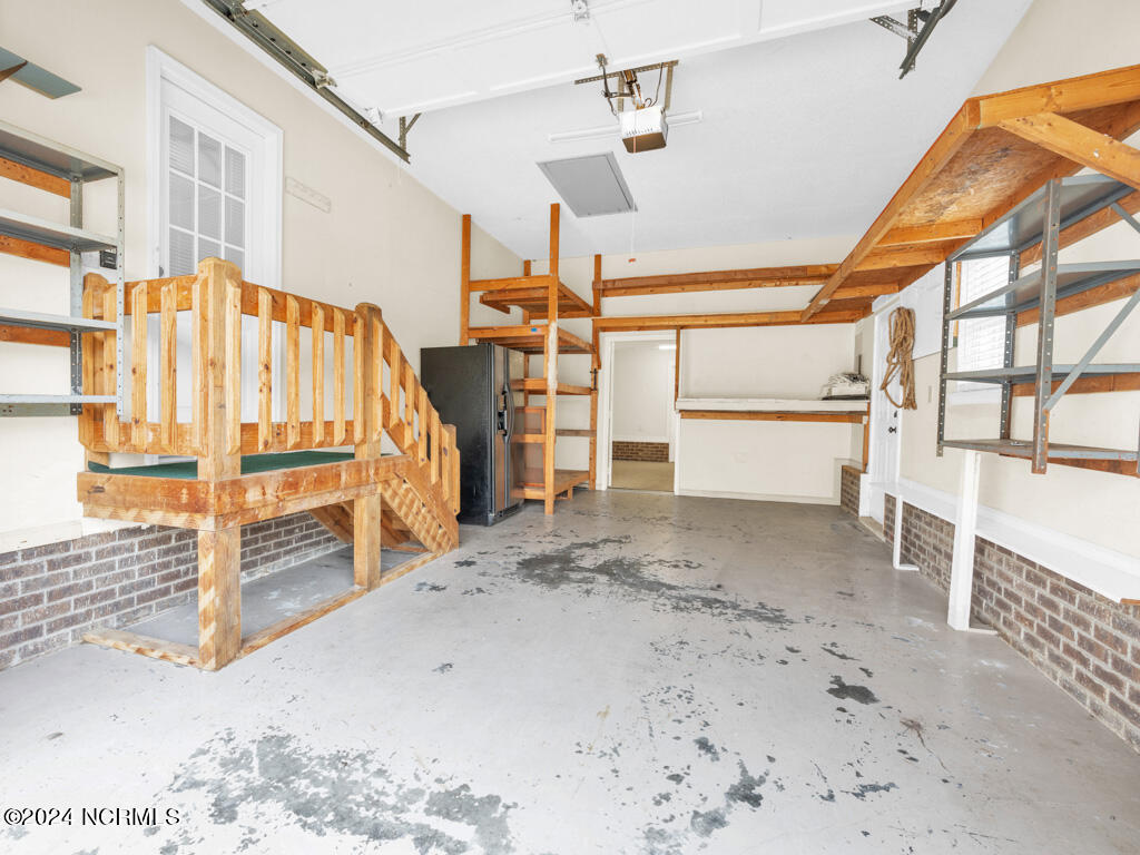409 Deer Path Calabash, NC 28467 - Photo 26 of 32 Plenty of storage opportunities and there are also pull down stairs.