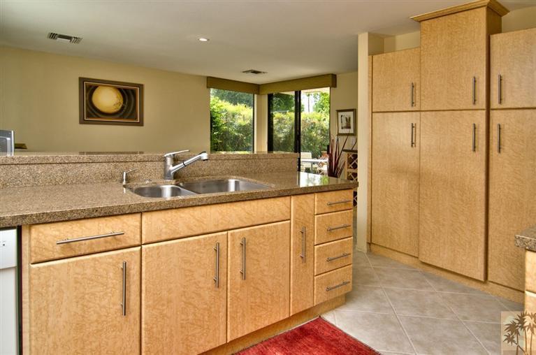 9 Seton Court Rancho Mirage, CA 92270 - Photo 11 of 42 a bathroom with a sink and a large mirror