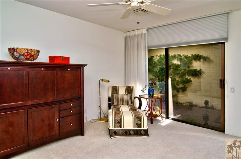 9 Seton Court Rancho Mirage, CA 92270 - Photo 24 of 42 a view of a livingroom with furniture and natural light