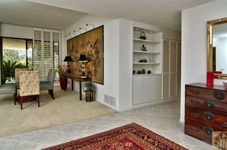 9 Seton Court Rancho Mirage, CA 92270 - Photo 28 of 42 a living room with furniture and large window