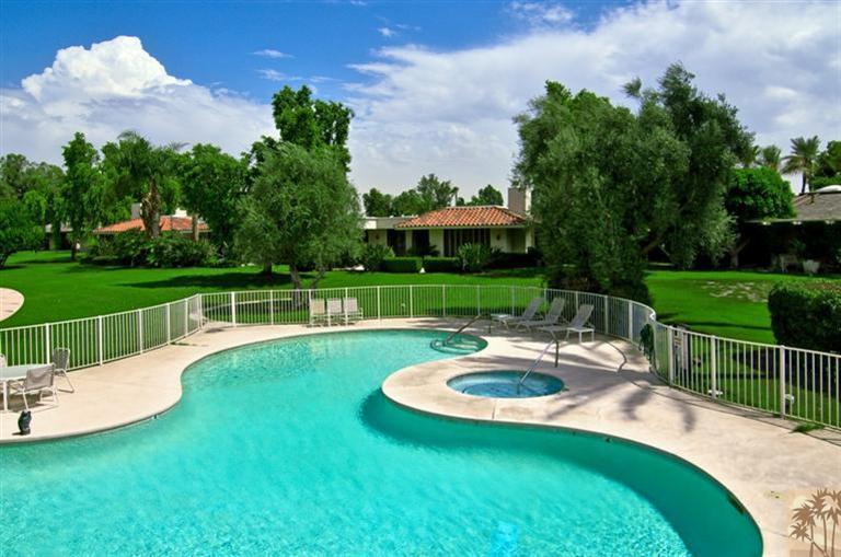 9 Seton Court Rancho Mirage, CA 92270 - Photo 32 of 42 a view of a garden with a slide