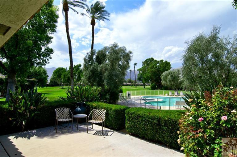 9 Seton Court Rancho Mirage, CA 92270 - Photo 36 of 42 a view of a swimming pool and lounge chair