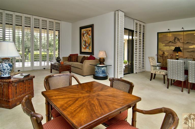 9 Seton Court Rancho Mirage, CA 92270 - Photo 8 of 42 a living room with furniture and a large window