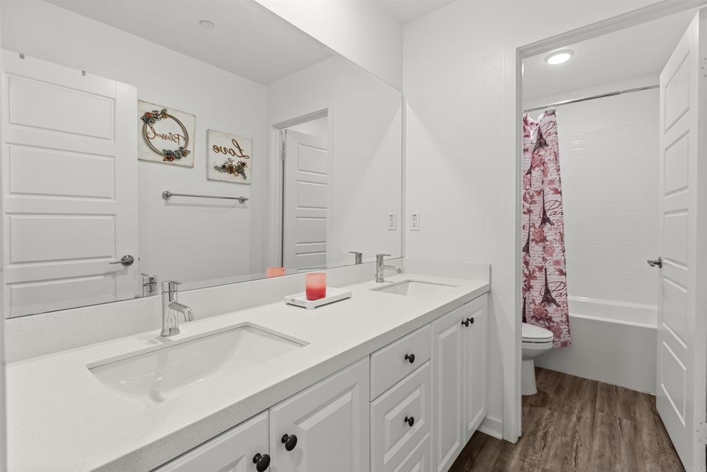 29809 Gypsy Vanner Way Menifee, CA 92584 - Photo 26 of 45 a bathroom with a sink and a mirror