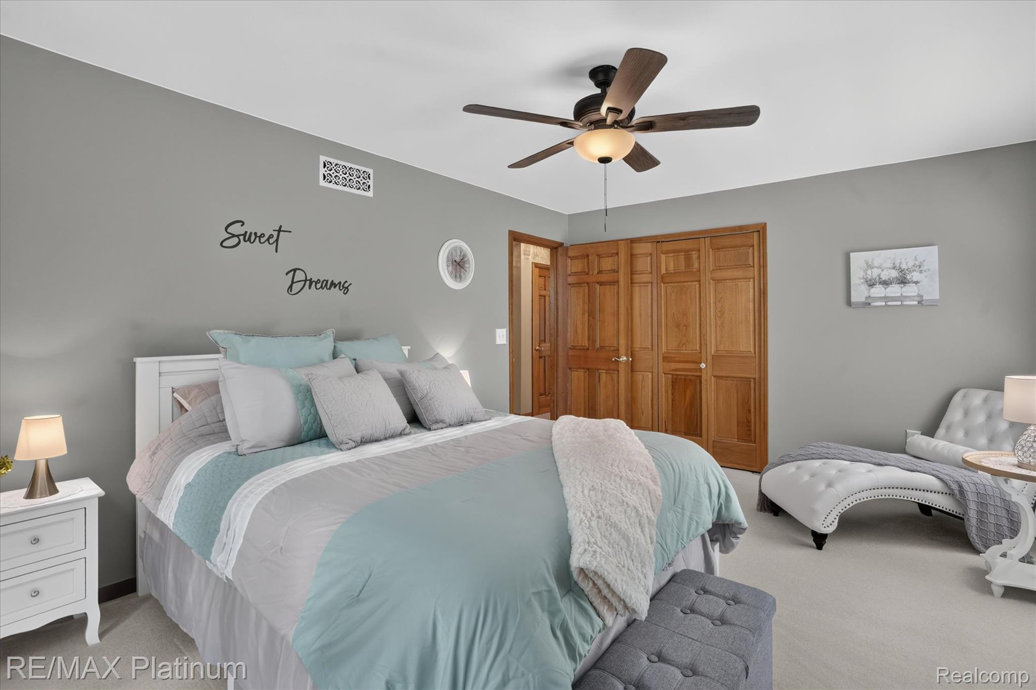 4457 Bradley Road Gregory, MI 48137 - Photo 23 of 79 Spacious room featuring light gray walls, white ceiling, and a ceiling fan with light fixture