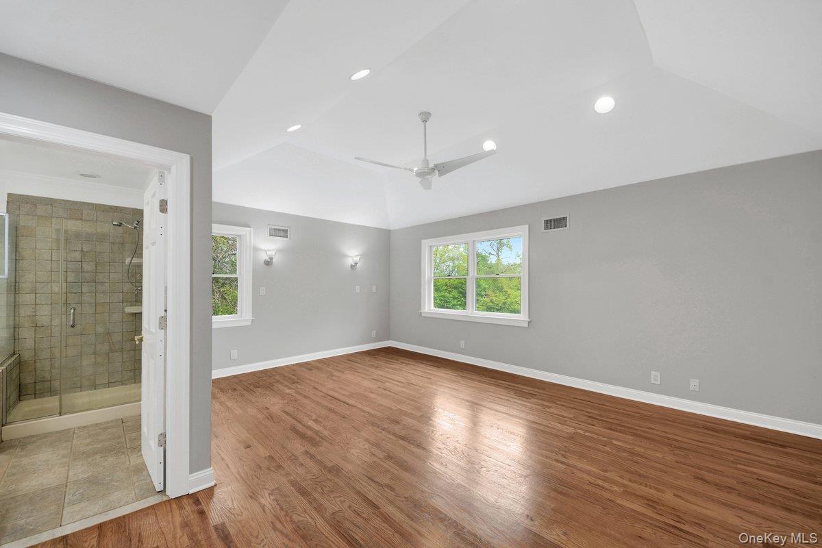 7 Rutledge Road Valhalla, NY 10595 - Photo 28 of 37 Spacious room featuring wood-finish flooring, vaulted ceiling, and recessed lighting