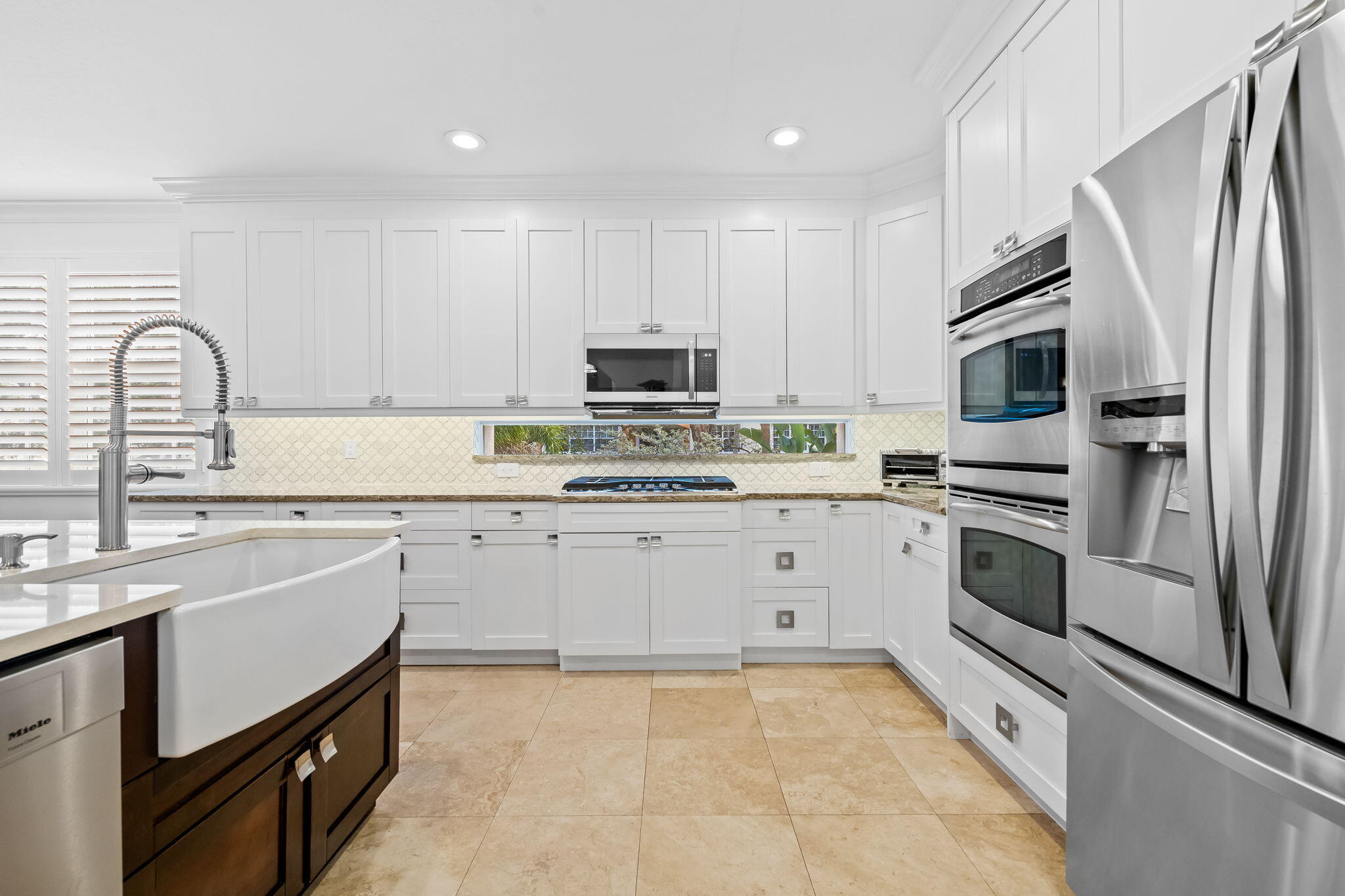 5580 Northeast Trieste Terrace Boca Raton, FL 33487 - Photo 9 of 33 Kitchen
