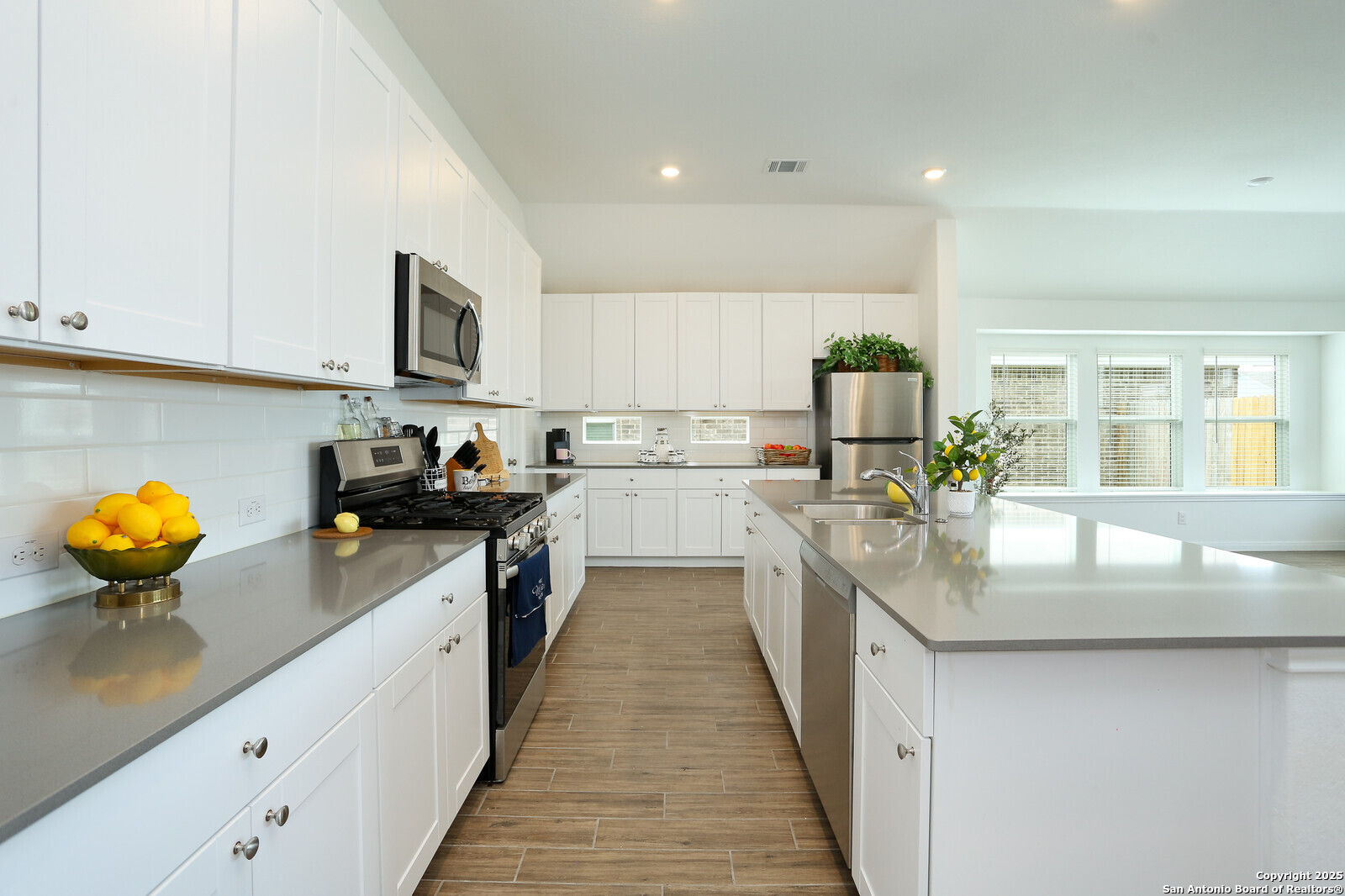 5798 Luciano Ridge Seguin, TX 78155 - Photo 11 of 36 a kitchen with stainless steel appliances granite countertop counter space a sink and cabinets