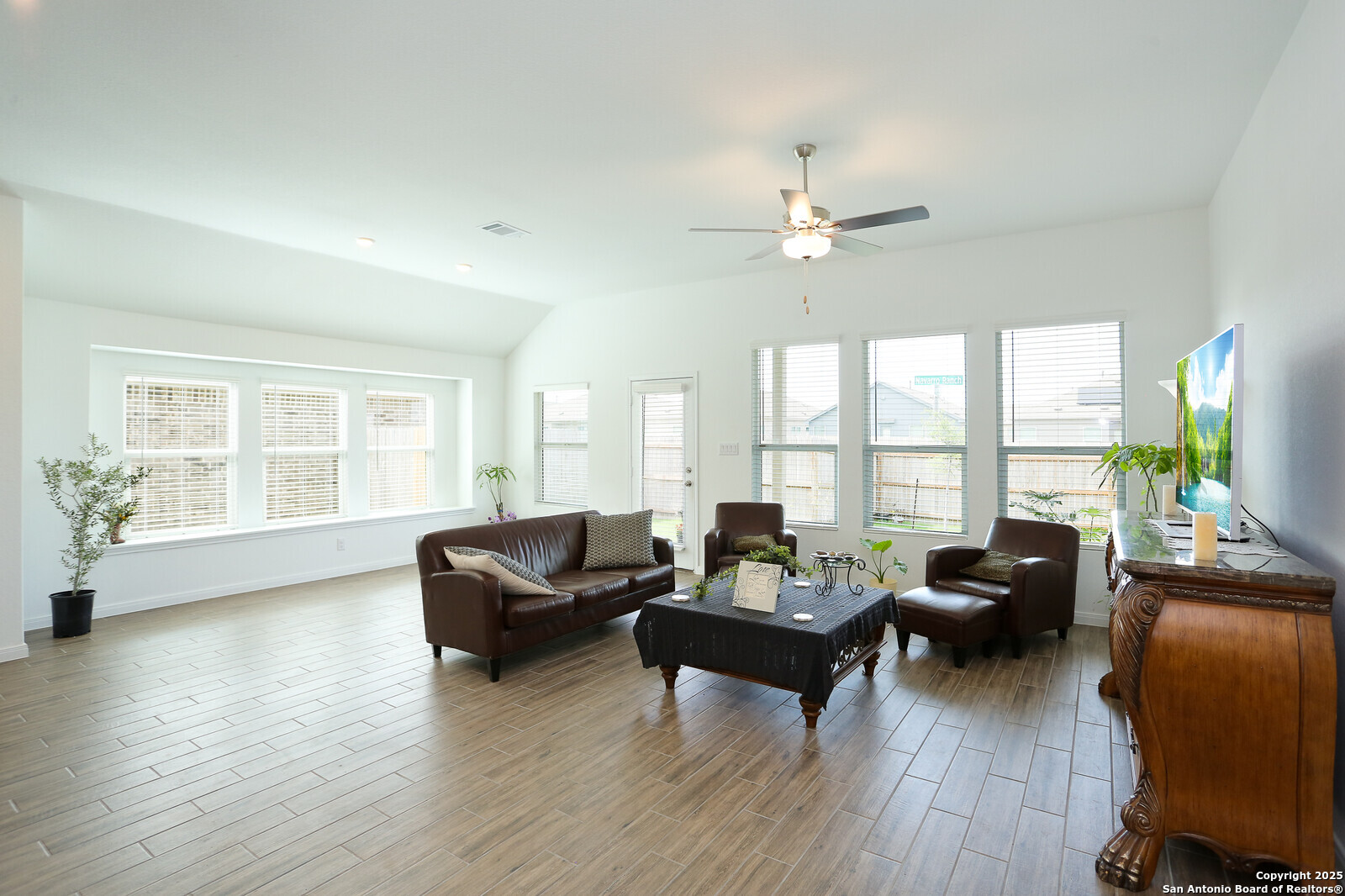 5798 Luciano Ridge Seguin, TX 78155 - Photo 13 of 36 a living room with furniture and a large window