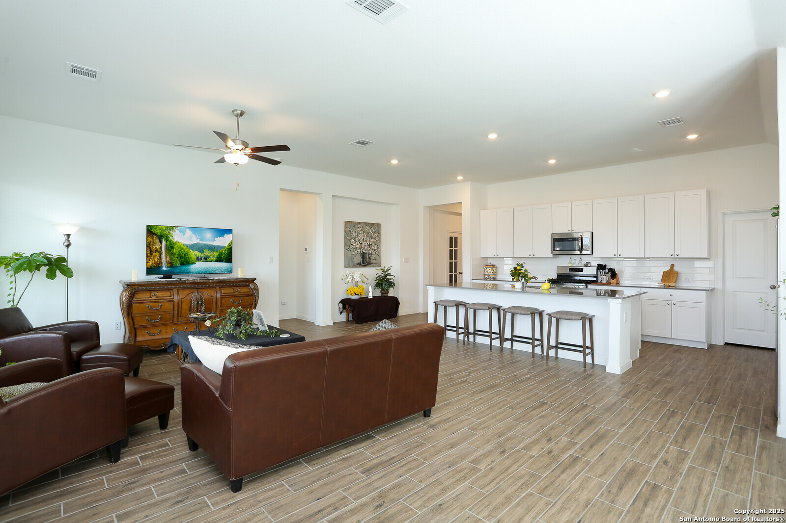 5798 Luciano Ridge Seguin, TX 78155 - Photo 15 of 36 a living room with furniture and a wooden floor