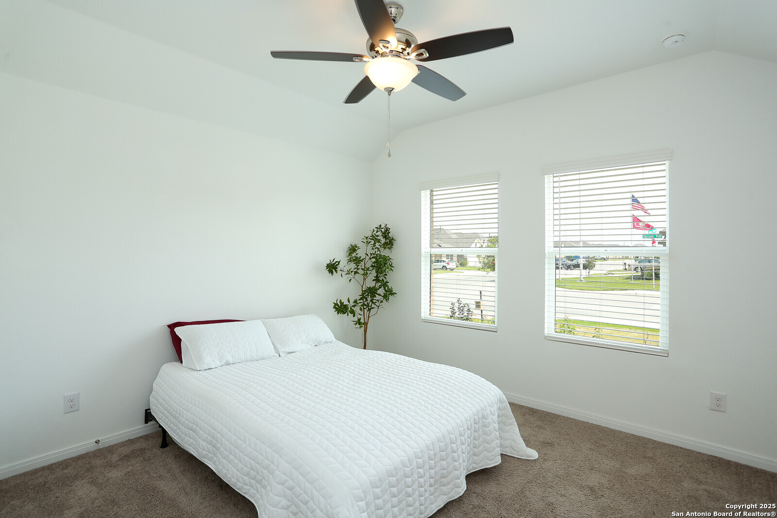 5798 Luciano Ridge Seguin, TX 78155 - Photo 20 of 36 a bedroom with a bed and a window