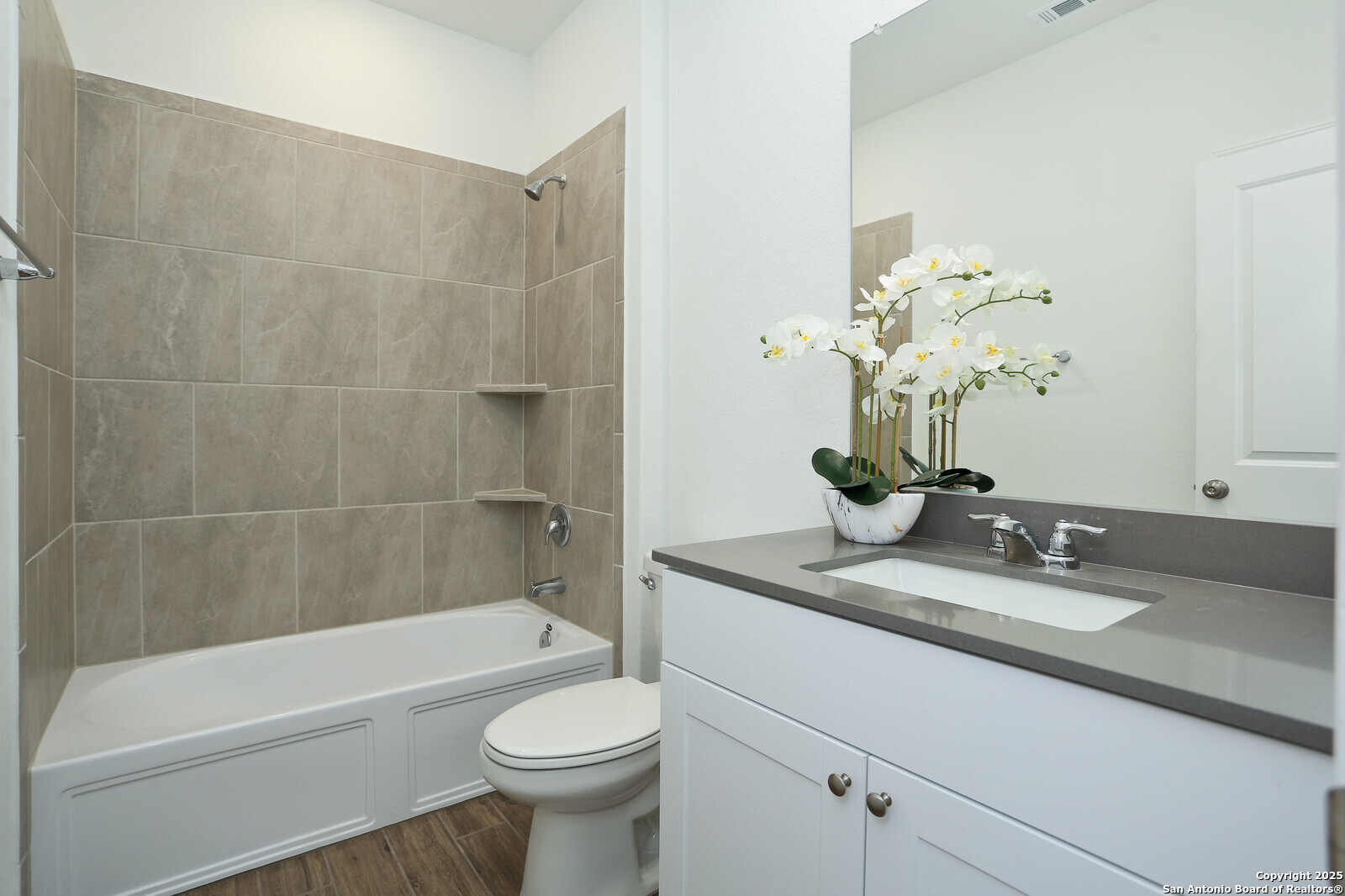 5798 Luciano Ridge Seguin, TX 78155 - Photo 23 of 36 a bathroom with a sink a toilet and bathtub