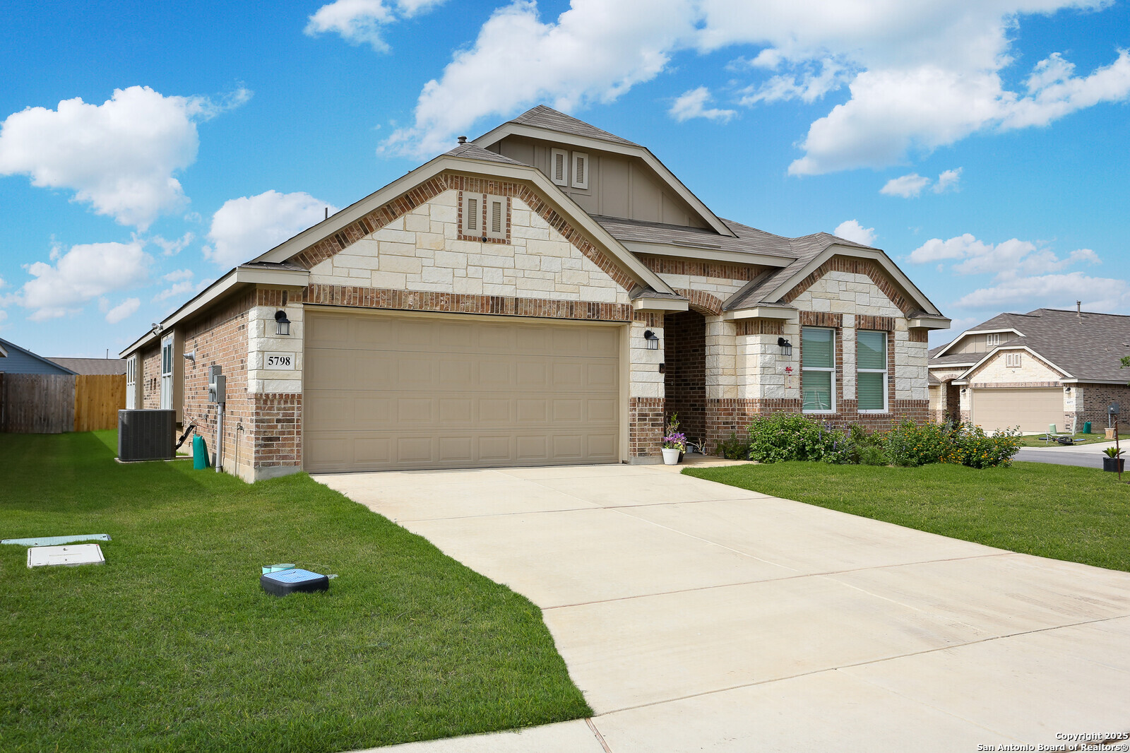 5798 Luciano Ridge Seguin, TX 78155 - Photo 4 of 36 a front view of a house with garden