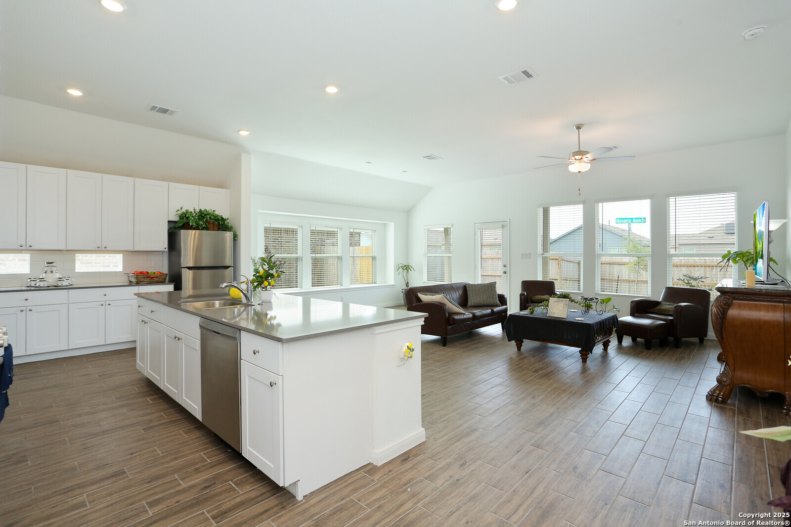 5798 Luciano Ridge Seguin, TX 78155 - Photo 8 of 36 a kitchen with sink stove and cabinets