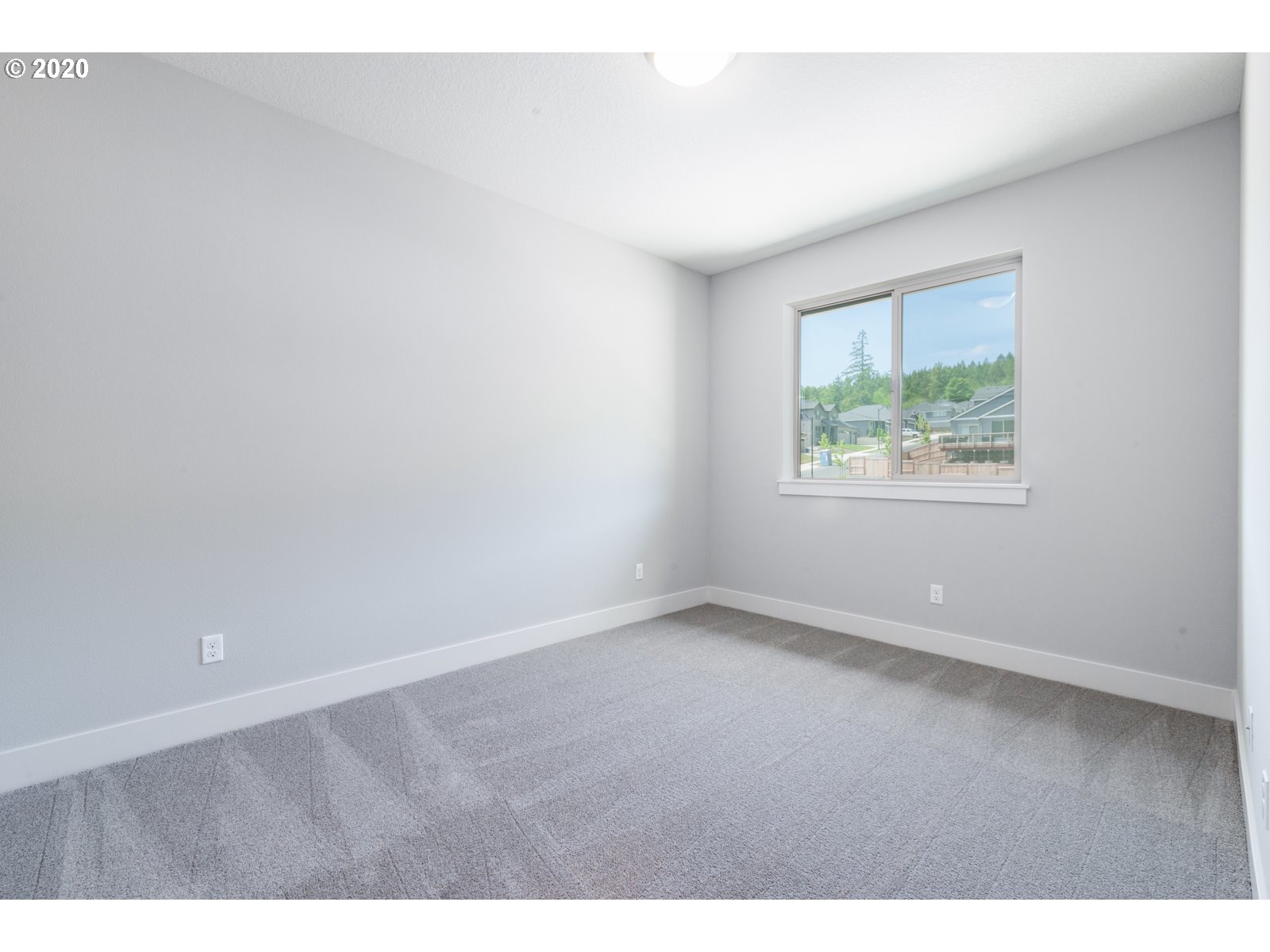 8807 North 5th Street, Unit LT52 Ridgefield, WA 98642 - Photo 24 of 31 a view of an empty room with a window