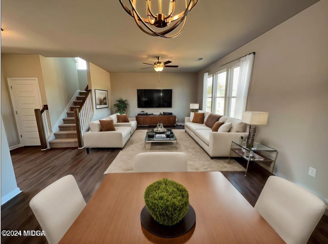 183 Sanders Road Macon, GA 31210 - Photo 13 of 44 a living room with furniture and a flat screen tv