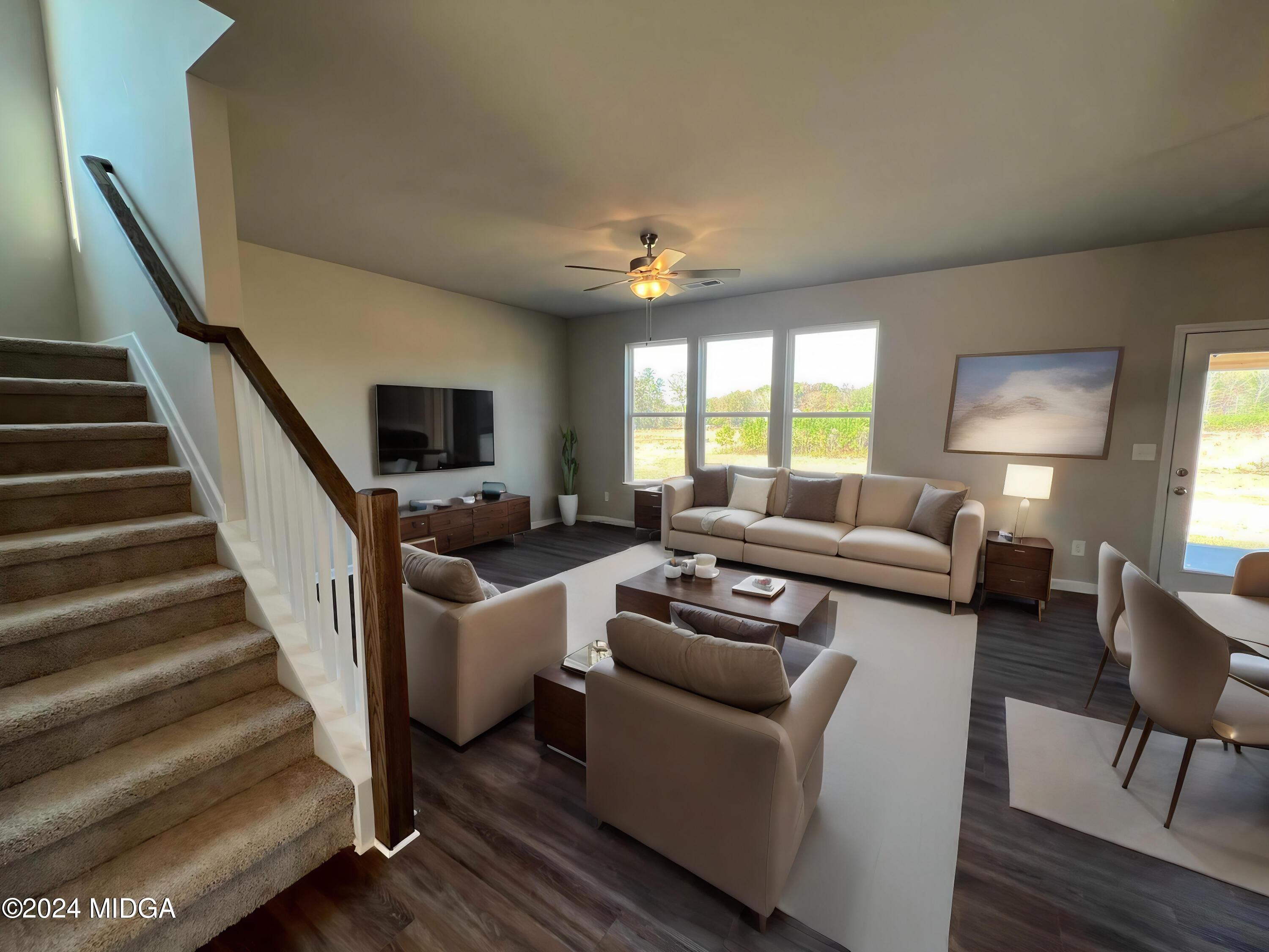 183 Sanders Road Macon, GA 31210 - Photo 18 of 44 a living room with furniture and a fireplace