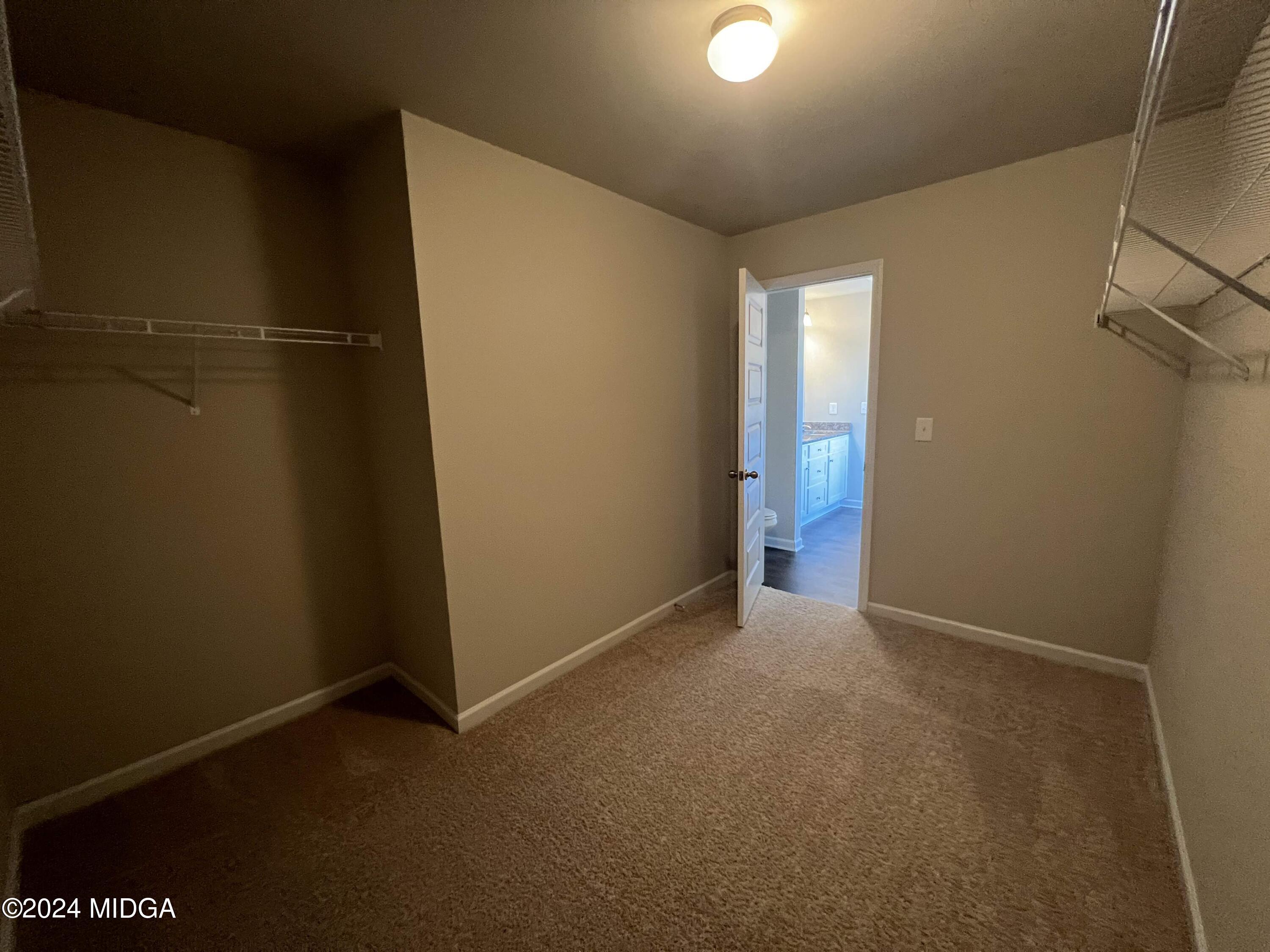 183 Sanders Road Macon, GA 31210 - Photo 19 of 44 an empty room with closet