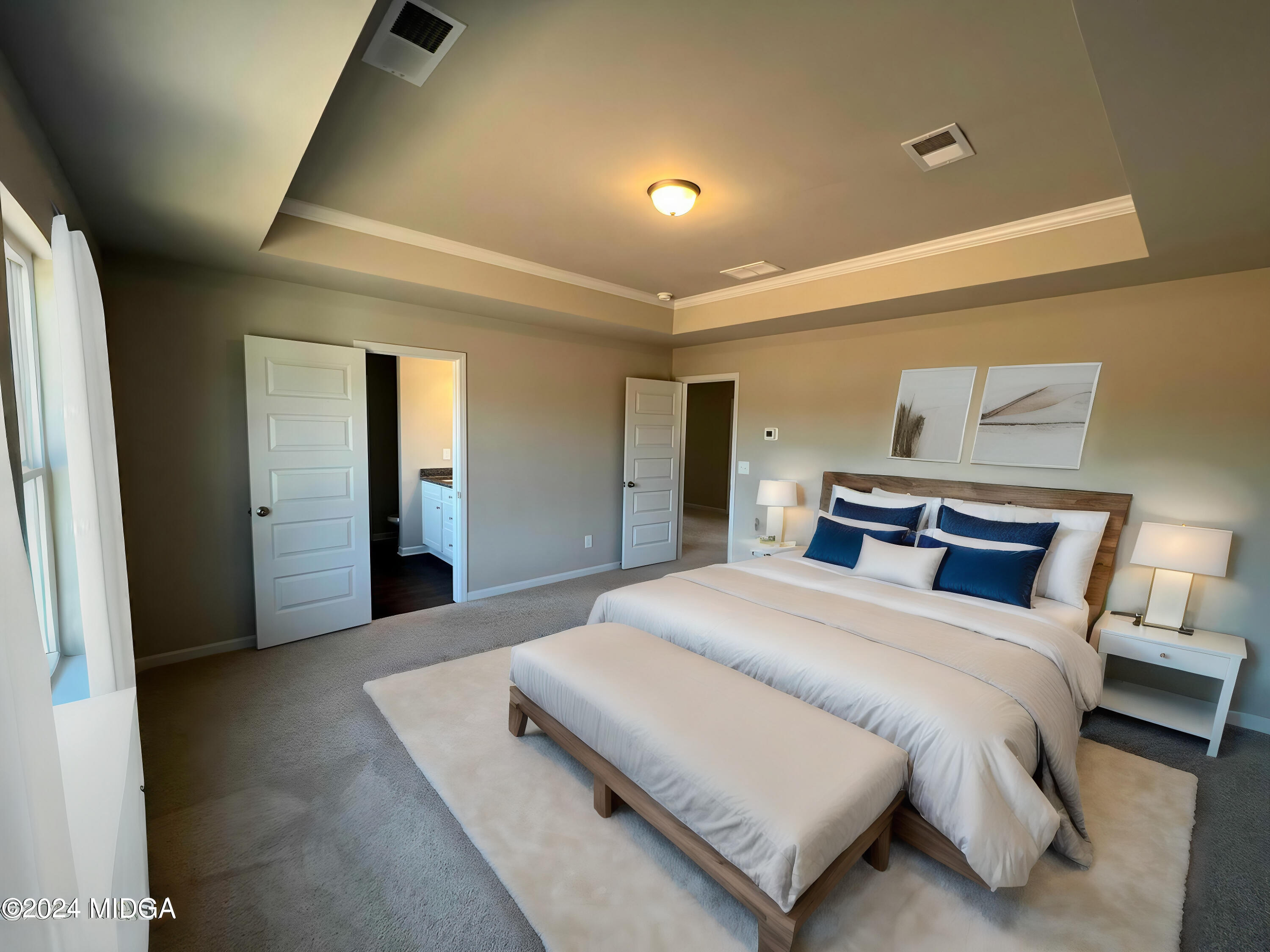 183 Sanders Road Macon, GA 31210 - Photo 25 of 44 a bedroom with a bed and a mirror