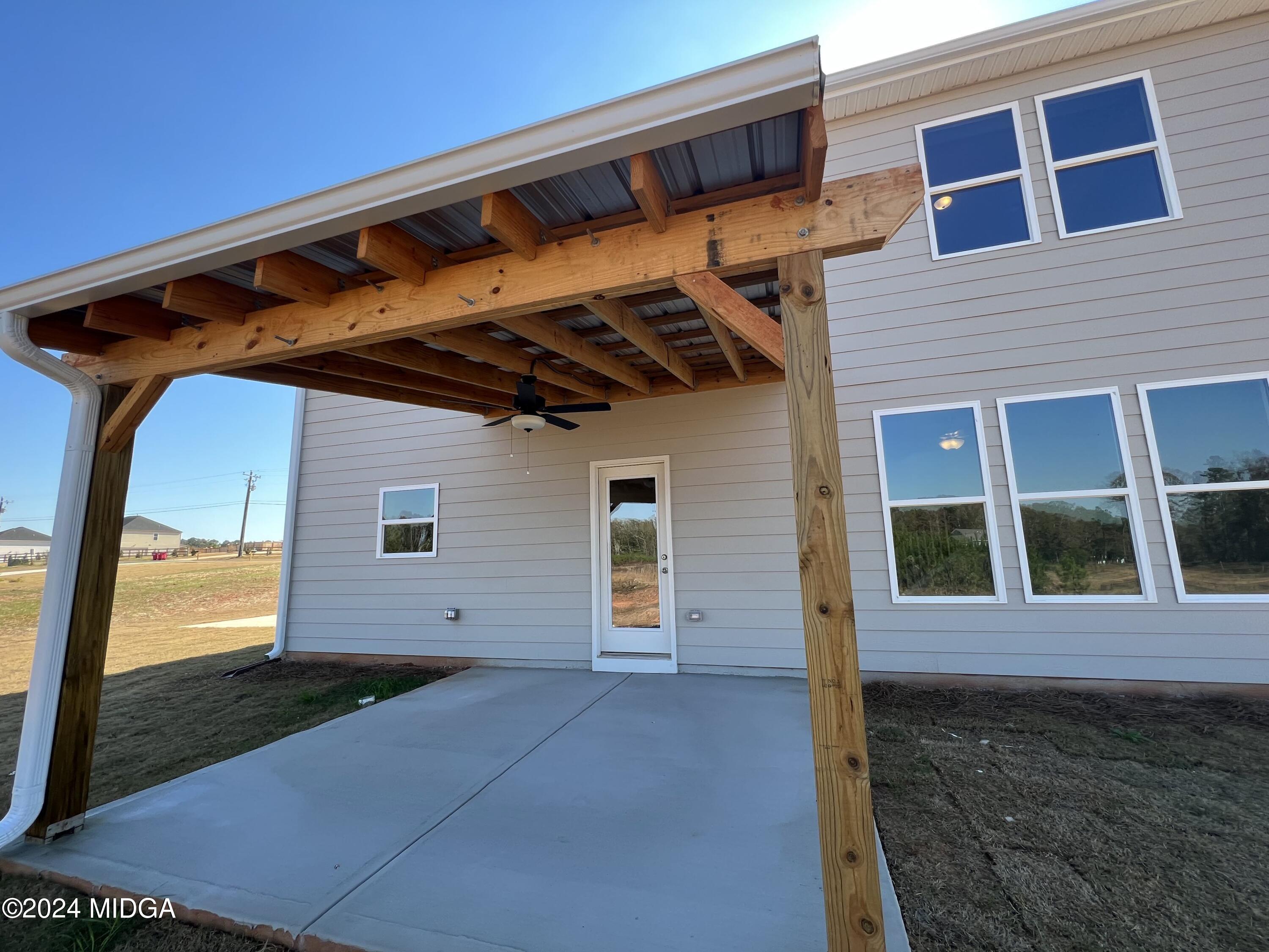 183 Sanders Road Macon, GA 31210 - Photo 34 of 44 a view of a house with a yard
