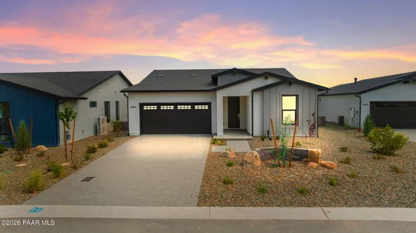 a front view of house with yard