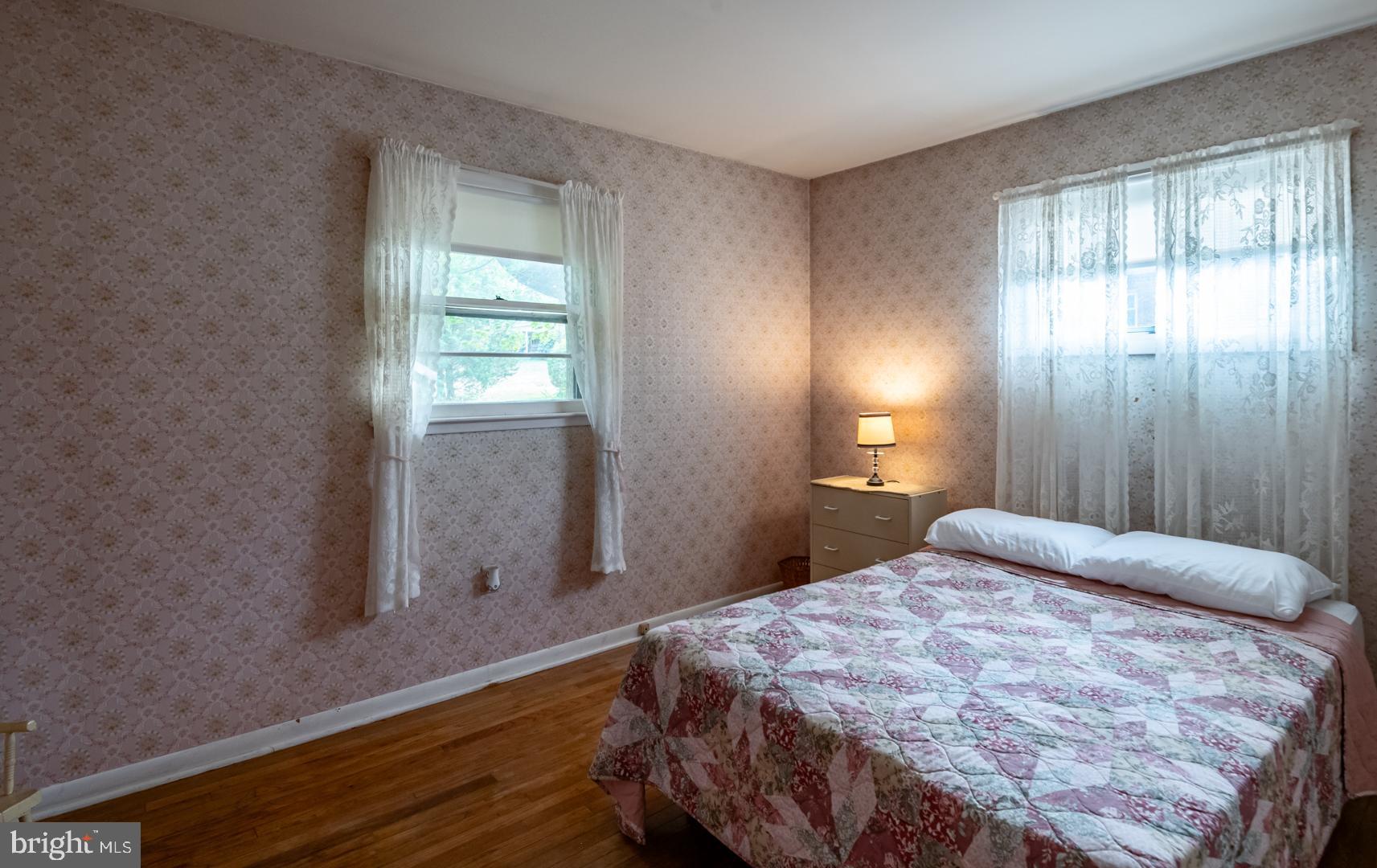207 Laurel Avenue Hamburg, PA 19526 - Photo 16 of 25 a bedroom with a bed and a window