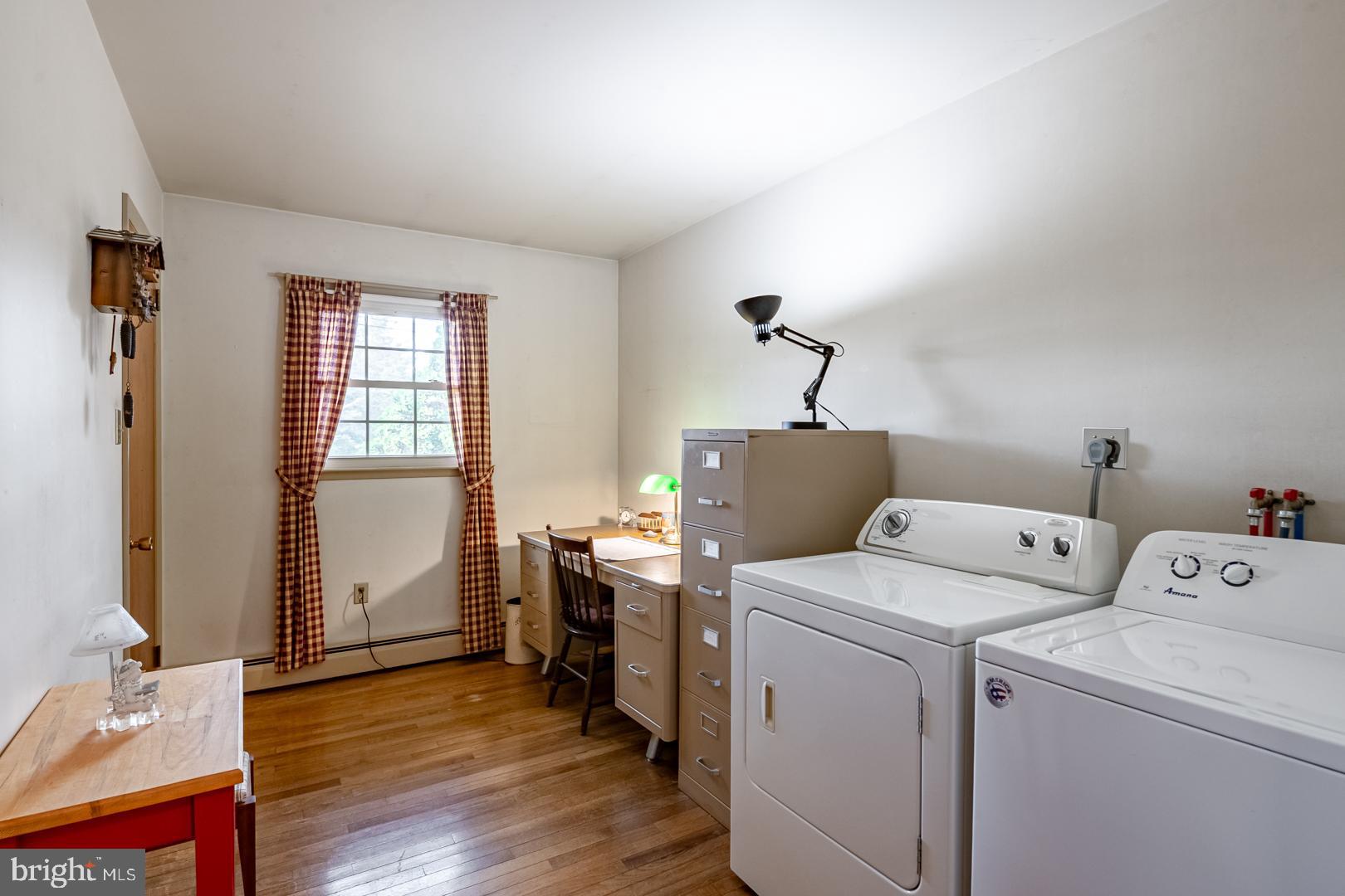 207 Laurel Avenue Hamburg, PA 19526 - Photo 17 of 25 a view of storage and utility room with washer and dryer