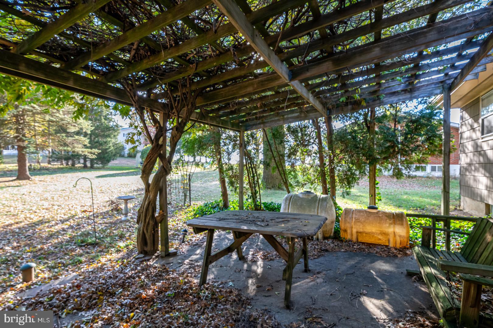 207 Laurel Avenue Hamburg, PA 19526 - Photo 18 of 25 a backyard of a house with table and chairs